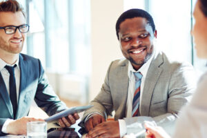 people smiling in meeting