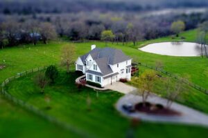 home with gated yard and pond