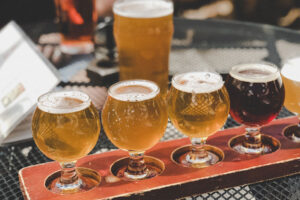 beer flight on table at distillery